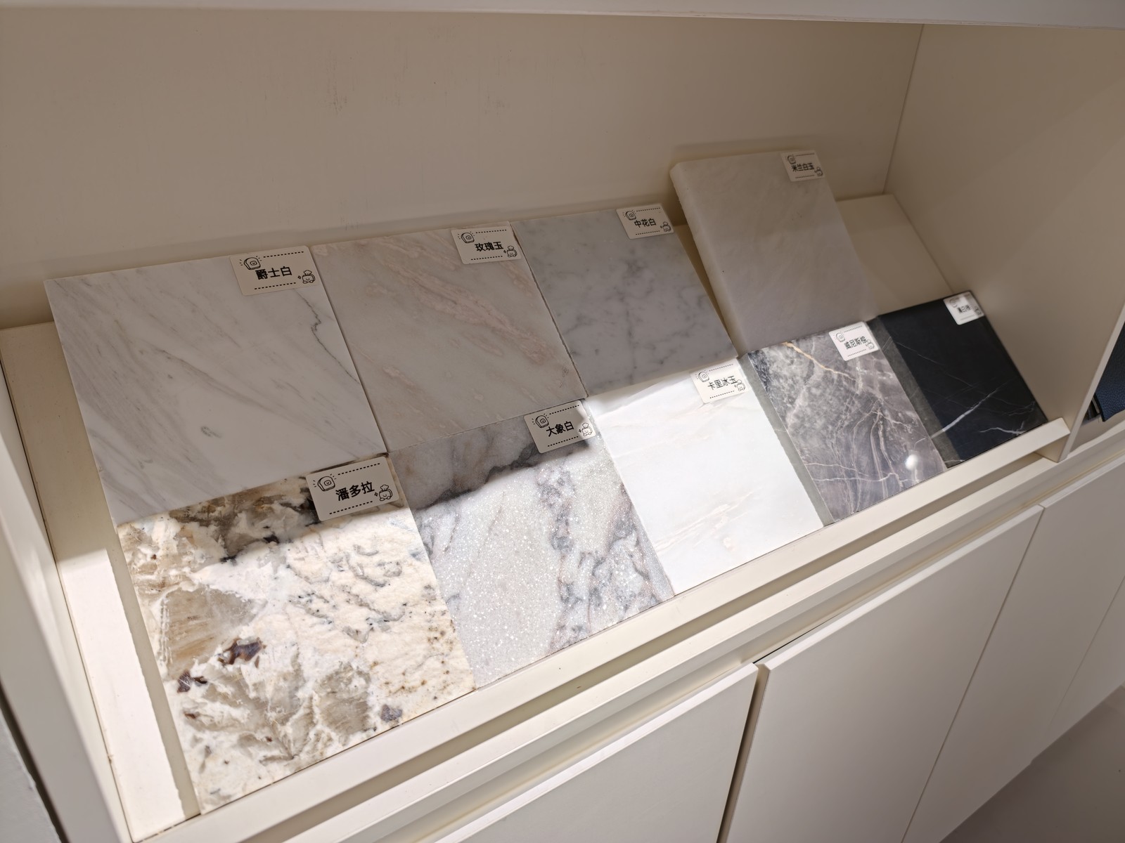 ATTICO CASA material swatch library — marble-look, leather, fabric options for custom orders